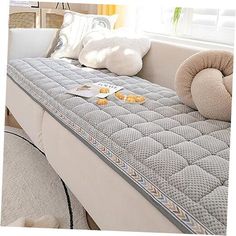 an image of a mattress with pillows on it