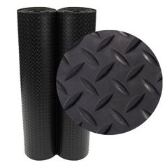 two black rubber mats are shown next to each other, with the same pattern on them