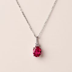 ◆ The pendant is handcrafted from sterling silver and decorated with a dazzling 7x9 mm lab Ruby . It is suitable for engagement/anniversary/daily occasion. ◆ Production Description: Main stone Type: Lab Ruby  Main Stone Shape: Oval Cut Main Stone Size: 7x9 mm(2.35 ct) Side stone: CZ Metal: 925 Sterling silver - Other options available in the drop down menu ◆ Customization: √Free for Add Engraving  √Other Metal Type Available √Other Gemstones & Shapes Available  √Personalization Requests Availabl Oval Ruby Necklace With Brilliant Cut, Elegant Ruby Oval Pendant Necklace, Oval Ruby Necklaces In White Gold, Elegant Ruby Necklace With Oval Pendant, White Gold Oval Ruby Necklaces, Oval Diamond Cut Necklace For Anniversary, Anniversary Oval Diamond Cut Necklace, Anniversary Cubic Zirconia Necklace With Oval Link, Anniversary Oval Pendant Necklace With Diamond Cut