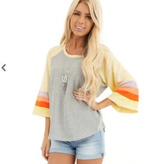 New With Tags Heather Gray And Multicolored Flare Sleeve Top Very Cute 80's Vibe Style 3/4 Flare Sleeve Cotton Polyester Blend Size: Large Colors: Heather Gray, Yellow, Purple And Shades Of Orange 23" Across Chest 26" Length Trendy Yellow Color Block Tops, Retro Color Block Tops For Fall, Retro Fall Color Block Tops, Yellow Cotton Color Block Tops, Trendy Spring Color Block Tops, Casual Yellow Color Block Top, Trendy Color Block Tops For Spring, Yellow Retro Color Block Tops, Retro Yellow Color Block Tops