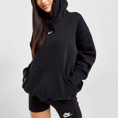 Level Up Your Laidback Rotation With This Women's Oversized Hoodie From Nike. In A Black Colourway, This Baggy-Fitting Hoodie Is Cut From Soft, Fleecey Fabric For Total Comfort. It Features An Adjustable Hood For Custom Coverage, With Ribbed Trims To Lock In The Fit And A Kangaroo Pouch For Your Everyday Essentials. Finished Up With Nike Swoosh Branding To The Chest. Nike Black Hoodie Outfit, Nike Oversized Hoodie, Nike Hoodie Outfit, Black Hoodie Outfit, Nike Sweatshirts Hoodie, Nike Jumper, Sweatshirts Hoodie Women, Black Nike Hoodie, Nike Quarter Zip