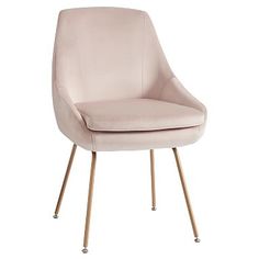 an upholstered chair with gold legs and a light pink velvet seat, viewed from the front