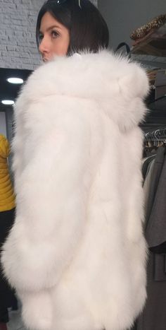 New,Natural,Real Beautiful Top quality Hooded WHITE FOX Fur Coat! Order it in Any length! Super Soft,Very light,warm,excellent quality! Leather belt included. Beautiful winter fur for all sizes,any length or without hood. All our furs have buttons,hooks,pockets and perfect lining! Made in Greece,in one of the best fur factories. We take orders in any size,color,model. Wholesale-retail. No returns accepted Cropped Fur Jacket, White Moth, White Faux Fur Coat, White Fur Coat, Cruella Deville, Womens Faux Fur Coat, Fur Hood Coat, Fur Coats Women, Fox Fur Coat