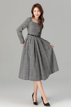 "The flared silhouette adds a feminine touch, making it suitable for various occasions. The wearer pairs it with a chic black handbag, completing the ensemble. Overall, this dress exudes understated elegance and style.  Details * 15% linen , 45% cotton , 40% polyester * Classic and beautiful plaid  * Fitted waist to show off your curves * Square neckline * Long sleeves  * Side zipper in the right side * Pleated on the waist * Midi dress * Wash by hand or machine with cold water MODEL SIZE Bust 8 Full Sleeve Frocks For Women, Square Dress Outfit, Retro Dress Outfits 90s, Retro Dress Outfits, Frock Styles, Womens Plaid Dress, Classical Dress, Water Model, Tailored Clothes