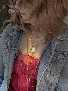 Capture the impactful symbology of natural gemstones with this artisan sequin bolo necklace. Adorned with a single natural keshi pearl, genuine Arizona Sleeping Beauty turquoise, micro faceted amazonite round & a hammered teardrop, this intentional necklace reflects the symbolism found throughout life's journey. Embrace the essence of the Desert & the Sea with peace of mind knowing this necklace was handcrafted in the USA with ethically sourced gemstones that tell a unique story. Baroque Keshi Pearl Sequin Chain Bolo Necklace Ft. Genuine Arizona Sleeping Beauty Turquoise (Necklace Only): ✿ Raw USA brass, natural baroque freshwater keshi pearl, genuine Arizona Sleeping Beauty turquoise, micro faceted Peruvian amazonite Please note - Items are made with raw bronze, copper & brass which may o Adjustable Gemstone Beads Lariat Necklace, Adjustable Lariat Crystal Necklace With Gemstone Beads, Spiritual Multi-strand Gemstone Necklaces, Unique Festival Necklaces With Round Pendant, Multicolor Lariat Long Necklace For Gifts, Bohemian Adjustable Lariat Necklace With Gemstone Beads, Adjustable Bohemian Lariat Necklace With Gemstone Beads, Gold Crystal Necklace With Round Gemstone Pendant, Adjustable Long Gemstone Beads Necklace