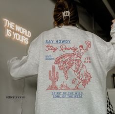 This Gender-Neutral Adult Hoodies & Sweatshirts item is sold by herandem. Ships from Charlotte, NC. Listed on Jan 20, 2024 Howdy Sweater, T-shirt Designs, Cowgirl Outfits Aesthetic, Cricut Sweatshirt Ideas, Western Gift Ideas, Western Stuff, Cowgirl Gifts, Aesthetic Gift, Western Aesthetic