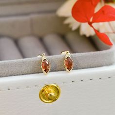 Add a touch of sophistication and romance to any outfit with our Red Garnet Earrings and January Birthstone Ring set. The marquise bezel ring and dainty gold design give a simple yet classic look. Perfect for a meaningful gift or to add to your own jewelry collection. ----------- DESCRIPTIONS -----------▪ Gemstone: Natural Garnet▪ Stone Shape: Marquise▪ Gem Size: 6mm▪ SKU: KE178▪ Material: 925 Sterling Silver▪ Plating: 14K Gold Vermeil ----------- MEANING -----------♥ Zodiac: Capricorn♥ Birthsto 14k Gold Marquise Earrings For Gift, Dainty Marquise Earrings As Gift, Yellow Gold Marquise Cut Earrings For Gift, Yellow Gold Marquise Cut Earrings As Gift, Rose Gold Marquise Earrings As Gift, Rose Gold Marquise Earrings For Gift, Capricorn Birthstone, Red Garnet Earrings, January Birthstone Rings