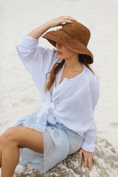 We adore this foldable, packable, and supremely soft straw crochet hat. Introducing the Leor Crochet Straw Hat, your ideal companion for everyday sun protection! Handcrafted from natural raffia palm, it offers all-day comfort and timeless style. The adjustable hat band ensures a personalized fit, while its crushable design makes it easy to carry anywhere. Approximately 3" brim Hand-crocheted from raffia straw in Madagascar Sizes may vary by up to 0.5 inches due to handmade quality; fits medium t Raffia Palm, Linen Midi Dress, Straw Hats, Linen Shop, Crochet Hat, Hat Band, Latest Outfits, Adjustable Hat, Summer Essentials