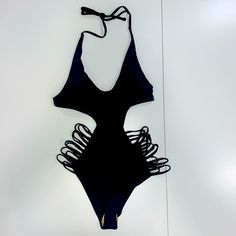 Nwot Matte Collection Black Halter Tie On One Piece Sexy Bathing Suit Never Worn, Still Has Hygienic Liner Size: Small Materials: 82% Nylon 18% Spandex Black Halter Neck Bodysuit For Beach, Black Halter Neck Bodysuit For The Beach, Summer Black Cutout Bodysuit, Black Triangle Top Bodysuit For Swimming, Black Halter Neck Bodysuit For Club, Black Triangle Top Bodysuit For Vacation, Black Strappy Lined Swimwear, Black Halter Neck Swimwear For Party, Black Cutout Backless Swimwear