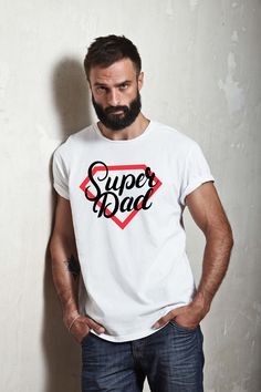 a man with a beard wearing a t - shirt that says super dad