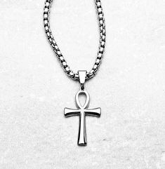 "《《  SPIRITUAL COLLECTION  》》 THE DETAILS The \"SILVER ANKH\" Necklace is designed with an smooth shiny Silver Stainless Steel Ankh Pendant, hung from a Silver Stainless Steel Box Chain available in your choice of length! THE SYMBOL ANKH: Also referred to as the Egyptian Cross, known as a powerful symbol for life itself, often worn for its representation of wisdom & insight. 💠🔶️💠View entire SPIRITUAL COLLECTION here: https://www.etsy.com/shop/mrmackjewelry/?section_id=27046119 MATERIALS * 1 1 Silver Ankh Necklace, Egyptian Cross, Necklace Length Chart, Ankh Pendant, Yin Yang Necklace, Ankh Necklace, Life Itself, Box Chain Necklace, Jewelry Care Instructions