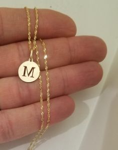 14k Real Solid Yellow Gold Initial M Pendant-Z3244 Chain: 14k Real Solid Yellow Gold Singapore Chain 16".18".20",22",24"-1.2mm Pendant:     Material Type: 14k Gold     Average Weight:  0.6g     Diameter:  12 mm 14k Gold Tarnish-resistant Initial Necklace, Gold 14k Tarnish Resistant Initial Necklace, 14k Gold Chain Necklace With Round Shape For Gift, Personalized 14k Gold Chain Necklace For Anniversary, Engraved 14k Gold Chain Necklace For Anniversary, 14k Gold Engraved Chain Necklace For Anniversary, 14k Gold Anniversary Chain Necklace With Round Pendant, 14k Gold Round Pendant Chain Necklace For Anniversary, 14k Gold Pendant Chain Necklace For Anniversary