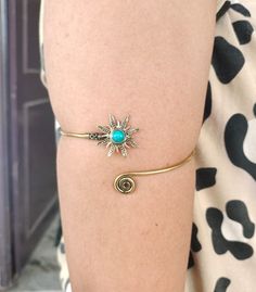 Turquoise Sun Adjustable Gold Arm Bracelet - Tribal Gemstone Crystal Festival Boho Jewelry, Upper arm cuff Metal:-Brass Handmade jewelry ❥ Customers satisfaction is our biggest priority, please contact us with any questions/queries for future or existing orders, and we will do our best to make sure you are happy with your order. ❥Please make sure to add the correct address during check out. You can return your purchased item within 15 days after successful delivery. We offer a 100% "Money Back G Bohemian Resizable Bangle Cuff Bracelet, Adjustable Turquoise Metal Cuff Bracelet, Bohemian Turquoise Metal Cuff Bracelet, Adjustable Bohemian Metal Body Jewelry, Adjustable Turquoise Cuff Bracelet For Festivals, Upper Arm Cuff, Upper Arm Cuffs, Arm Bracelet, Arm Bracelets