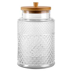 a clear glass jar with wooden lid