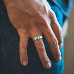 Tradition meets modern minimalism with our Trinity turquoise ring. Inspired by the intricate art of inlay, this piece is a reimagined version of our beloved Infinity Ring, now boasting a wider band and thicker turquoise. Designed for the minimalist, it's sleek silhouette exudes understated elegance, making it perfect for everyday wear. Sterling Silver Ring Natural Turquoise Inlay 1/4" Width Satin Finished