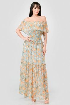 Elevate your event attire with our Floral Off Shoulder Wedding Guest Maxi Dress, a captivating ensemble designed for special occasions. Crafted from lightweight chiffon, this dress features elegant ruffled tiers and a smocked back that ensure both style and comfort. Its off-the-shoulder design adds a touch of romance, making it perfect for weddings, garden parties, and beach events. Key Features: Fabric: 100% Polyester chiffon for a flowy and graceful silhouette. Unique Design: Off-the-shoulder neckline with smocked back and tiered ruffles. Color: Vibrant blue, offering a fresh and appealing look. Size Options: Available in sizes S, M, L to suit a variety of body types. Why Buy This Dress: Choose our Floral Off Shoulder Maxi Dress to make a stylish statement at any wedding or festive occas Tiered Ruffles Bridesmaid Dress, Tiered Bridesmaid Dress With Ruffles, Flowy Chiffon Dress With Smocked Bodice, Chiffon Maxi Dress With Smocked Back, Summer Wedding Chiffon Dress With Ruffles, Fitted Chiffon Maxi Dress With Smocked Back, Tiered Ruffle Bridesmaid Maxi Dress, Tiered Ruffle Maxi Dress For Bridesmaids, Bridesmaid Tiered Maxi Dress With Ruffles