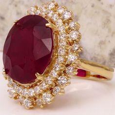 19.26 Carats Impressive Red Ruby and Diamond 14K Yellow Gold Ring Suggested Replacement Value $8,400.00 Total Red Ruby Weight is: 17.36 Carats (glass filled) Ruby Measures: 15.74 x 13.96mm Natural Round Diamonds Weight: 1.90 Carats (color G / Clarity VS2-SI1) Ring total weight: 11.6 grams Disclaimer: all weights, measurements and colors are approximate and may vary slightly from the listed dimensions or as seen in the image. All pictures are magnified to show the smallest of details. Please, ref Ruby Jewelry Ring, Ruby Ring Designs, Gold Jewelry Outfits, Emerald Wedding Rings, Bollywood Jewelry, Etsy Gold Ring, Royal Jewels, Silver Jewelry Fashion, Ruby Jewelry