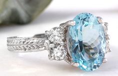 4.65 Carats Natural Aquamarine and Diamond 14K Solid White Gold Ring Suggested Replacement Value: Approx. $5,200.00 Total Natural Oval Cut Aquamarine Weights: Approx. 4.00 Carats Aquamarine Measures: Approx. 11.00 x 9mm Natural Round Diamonds Weight: Approx. 0.65 Carats (color G-H / Clarity SI1-SI2) Ring total weight: Approx. 5.2 grams Disclaimer: all weights, measurements and colors are approximate and may vary slightly from the listed dimensions or as seen in the image. All pictures are magnif Formal Oval Topaz Ring Gia Certified, Oval Gia Certified Topaz Ring For Formal Occasions, Gia Certified Oval Topaz Ring For Formal Occasions, Luxury Gia Certified Topaz Ring, Luxury Gia Certified Round Topaz Ring, Luxury Gia Certified Topaz Ring For Formal Occasions, Formal Round Gia Certified Topaz Ring, Gia Certified Round Cut Topaz Ring For Formal Occasions, Gia Certified Topaz Ring For Formal Occasions