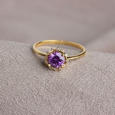 Amethyst helps to reduce stress, increase attention and concentration, and provide emotional balance. Our 14K Solid Gold round amethyst ring surrounded by real diamonds is suitable for daily use with its special design and will be your indispensable jewelry that you can use on your special days. A stylish jewel for you and your loved ones. Time to pamper yourself and your loved ones... Amethyst is the birthstone for those born in February. 🤍🤍 Special gifts for your special moments. We produce Round Amethyst Ring, Gold Amethyst Ring With Diamond Halo Setting, Yellow Gold Amethyst Diamond Ring With Halo Setting, Yellow Gold Amethyst Ring With Halo Setting For Promise, Elegant Purple Diamond Birthstone Ring, Purple Diamond Halo Ring, Gold Amethyst Ring With Halo Setting, 14k Gold Purple Halo Setting Ring, Yellow Gold Amethyst Ring With Halo Setting As Gift