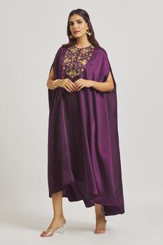 Purple heavy satin dress with contrast cut work floral zardozi embroidered yoke.
Components: 1
Pattern: Embroidered
Type Of Work: Zardozi Floral Patterns
Neckline: Round
Sleeve Type: Batwing
Fabric: Satin
Color: Purple
Other Details: 
Asymmetric hem
Attached lining
Product weight: 1 kg
Occasion: Mehendi and Haldi - Aza Fashions Bollywood Style Dress With Embroidered Border For Reception, Silk Semi-stitched Embroidered Dress For Eid, Silk Gown With Resham Embroidery For Eid, Eid Silk Gown With Dabka Work, Embroidered Raw Silk Dress For Eid, Eid Art Silk Gown With Dabka Work, Anarkali Embroidered Dress For Eid With Embroidered Border, Chanderi Gown For Eid, Eid Anarkali Silk Embroidered Dress