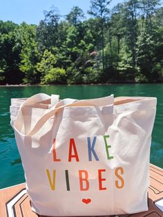 Colorful Lake Vibes XL Tote Bag Measures 20"W x 15"H x 5"D 100% Cotton30.00 Multicolor Shoulder Bag For Weekend, Multicolor Large Capacity Bags For Weekend, Large Capacity Multicolor Weekend Bags, Large Capacity Multicolor Bag For Weekend, Multicolor Tote Beach Bag For Weekend, Multicolor Rectangular Bag For Weekend, Multicolor Rectangular Bags For Weekend, Lake Vibes, Midwife Gift