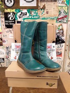 This is our only pair of these boots by Dr MARTENS  that were hugely successful when in production.  This boot was deleted a few years ago, yet ladies continue to ask for them. We have come across a couple in our warehouse. They are the Authentic Wedge boot finished in a supple Peacock coloured leather. They have side zips and are very stylish. They are women's size UK 3, EUR 36, ladies US 5 Green Waterproof Boots With Round Toe, Green Casual Boots With Snip Toe, Casual Green Boots With Snip Toe, Green Casual Heeled Boots With Round Toe, Casual Green Round Toe Heeled Boots, Green Boots With Rubber Sole And Round Toe, Vintage Green Leather Boots, Vintage Green Boots With Round Toe, Green Boots With Reinforced Heel And Closed Toe