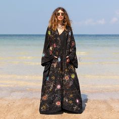 Zinnia Pearl Unleash your boho spirit and make a statement with our Kosmos Patchwork Celestial Vibes Kimono. This bohemian dream features intricate patchwork and cosmic embroidery, paying homage to the wonders of the universe. The open front and relaxed fit offer versatility and comfort, perfect for any season. Jet-set on adventures or dance the night away - this handmade, one-of-a-kind piece celebrates your individual style and love for nature's marvels. Features: * Stonewashed fabric adds a vi Cosmic Embroidery, Patchwork Kimono, Bohemian Look, Denim Patchwork, Oversized Silhouette, Patchwork Designs, Wide Sleeves, Individual Style, Jet Set