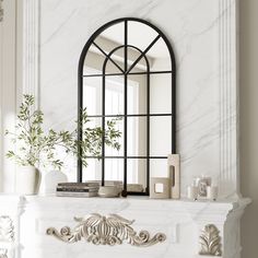 a white fireplace with a mirror on the mantle and plants in vases next to it