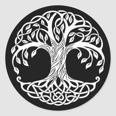 a celtic tree of life sticker with black and white design on the bottom side