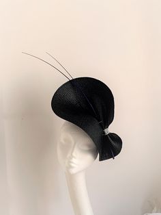 Black silver fascinator hat This lovely fascinator hat is made inspired by the coming races. The black silver fascinator hat will be an amazing accessory to compliment your outfit. A black silver fascinator hat will fit an average head size. Its made from black silk covered headband attached to the polybraid base on which sits blue colour feathers and diamontes. There is a comb attached to the headband so the fascinator sits steady on your hair. Please conatct me if you need this fascinator in a Silver Fascinator, White Fascinator, Bespoke Hats, Derby Hats Fascinators, Derby Fascinator, Black Fascinator, Hat Fascinator, Wedding Hat, Wedding Fascinators