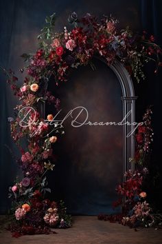 an arch decorated with flowers and vines is the focal point for this photo, which reads'beautiful '