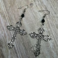 These earrings feature beautiful large cross pendants with a glass bicone bead accent. All metal findings except the charms are stainless steel. All the charms are coated with Everbrite coating which means that it is safe for people with metal allergies, and will not tarnish! Please choose from the following stainless steel attachments: 1 - Standard earring hook (comes with an earring stopper) 2 - Earring stud (comes with an earring stopper) 3 - Small lobster claw (3mm inside diameter) 4 - Large Black Cross Necklace, Christian Cross Necklace, Punk Rock Jewelry, Pentagram Necklace, Grunge Jewelry, Cross Choker, Titanium Earrings, Alloy Earrings, Black Cross