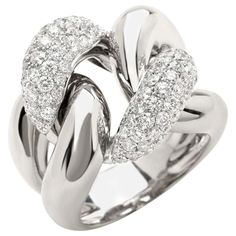 a white gold ring with diamonds in the center and an intertwined design on top