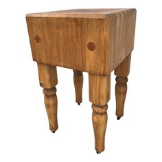 a small wooden table with legs and a drawer on the top that has holes in it