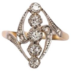 Beautiful Art Nouveau ring (1910c.a.) set in gold and platinum with old cut and rose cut diamonds of circa 0.35ct total, stamped 18ct. Highlights - Art Nouveau period ring 1910 c.a. - 18ct gold and platinum setting - Old cut and rose cut diamonds for circa 0.35ct total Measurements - Length 1.8cm x Width 1.2cm - Weight 2.85gr - Italian ring size 17 (size can be altered if required) 1950s Engagement Ring, Gold Marquise Ring, Italian Ring, Art Nouveau Engagement Ring, Three Diamond Ring, Lalique Jewelry, Opal Art, Art Nouveau Ring, Yellow Gold Diamond Ring