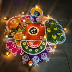 a colorful rangdi with lights on the ground