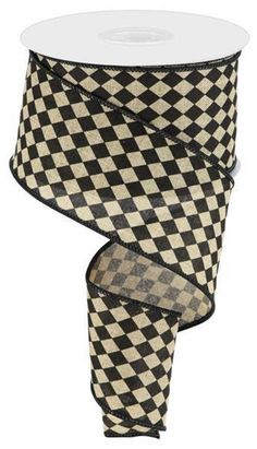 a roll of black and white checkered ribbon