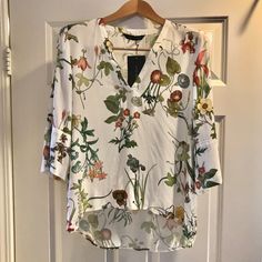 Nwt Zara Ivory Floral V Neck 3/4 Sleeve Blouse M. Cute For Work Or Play. Lightweight. Notched Sides. White 3/4 Sleeve Summer Blouse, White 3/4 Sleeve Blouse For Work, Spring Workwear Blouse With 3/4 Sleeves, Floral Print 3/4 Sleeve Workwear Blouse, Summer Workwear Blouse With 3/4 Sleeves, Floral Print 3/4 Sleeve Work Blouse, Floral Print Workwear Blouse With 3/4 Sleeves, White Half Sleeve Blouse For Spring, Elegant White Half Sleeve Blouse