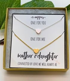 "Looking for the perfect gift? Our Mother Daughter Necklaces are a unique Mother's Day gift, birthday present for mom, or a \"just because\" gift! One for you, one for me... Connected by love we will always be! Show mom just how much she means to you! ∙ ∙ ∙ ∙ ∙ ∙ ∙ ∙ ∙ ∙ ∙ ∙ ∙ ∙ ∙ ∙ ∙ ∙ ∙ ∙ ∙ ∙ ∙ ∙ ∙ ∙ ∙ ∙ ∙ ∙ ∙ ∙ ∙ ∙ ∙ ∙ A V A I L A B L E ∙ C O L O R S This gift set is available in gold and silver finish. F R E E ∙ G O O D I E S This item comes with a FREE gift box, gift tag and jewelry bag! It Mother Daughter Necklaces, Daughter Necklaces, Birthday Present For Mom, Mom Daughter Jewelry, Daughter Bracelet, Mother Daughter Jewelry, Mother Daughter Bracelets, Present For Mom, Birthday Presents For Mom