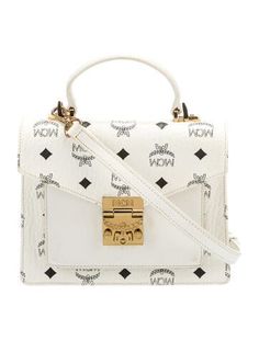 MCM Top Handle BagWhitePrintedGold-Tone HardwareLeather TrimFlat Handle & Single Adjustable Shoulder StrapLeather Trim Embellishment & Single Exterior PocketSuede Lining & Dual Interior PocketsPush-Lock Closure at Front Designer White Shoulder Bag With Detachable Strap, White Shoulder Bag With Leather Handles For Evening, Designer White Leather Shoulder Bag, White Office Bags With Branded Hardware, White Bags With Branded Hardware For Office, White Bags With Leather Handles For Formal Occasions, White Evening Bag With Branded Hardware, White Formal Bags With Leather Handles, Formal White Bags With Leather Handles