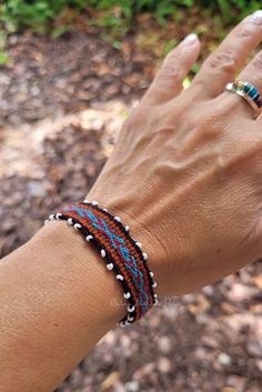 These colorful bracelets are handmade and are hand-woven wool and some of them with details with small white beads. They are beautiful in vibrant colors with a variety of uses as bracelets or anklets and add color and fun. They are approximately 9 inches long (stretches slightly) and wrap around a part of your body by tying the loose ends. Material: Alpaca Wool Made in Cusco - Peru The color may appear different to the actual item, depending on your screen settings. Thank you for visiting 😊 Hippie Hand-strung Braided Bracelets For Gifts, Fair Trade Bracelet Jewelry For Festivals, Fair Trade Festival Bracelet Jewelry, Adjustable Fair Trade Beaded Bracelets As Gifts, Adjustable Fair Trade Beaded Bracelets Gift, Adjustable Fair Trade Bracelets As Gifts, Bohemian Braided Jubilee Bracelet As A Gift, Fair Trade Adjustable Bracelets, Fair Trade Adjustable Bracelets As Gift