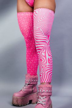 Add some electrifying fun to your rave outfit with Electricity Leg Sleeves! These quirky sleeves will light up your look and keep your legs feeling snug and supported all night long. So go ahead, dance the night away with a playful spark in your step! ⚡️ Product Details: Duality but Neon Pink 🩷 UV Reactive FRW Exclusive! Leg Sleeves Soft and Stretchy Made on Recycled Material ♻️ 85% Recycled PET Polyester, 15% Spandex Handmade in San Diego, CA Satisfaction Guaranteed Lifetime Warranty *Talia is wearing a size X-Small. Due to varying screen display settings, you may see some fabric images brighter or darker than the real fabric. So please consider that tolerance before ordering based on the website images. We won't be responsible for complaints regarding coloring. Rave Outfits With Pants, Rave Bottoms For Club In Spring, Spring Rave Bottoms For Club, Spring Club Rave Bottoms, Spring Rave Club Bottoms, Trendy Fitted Pink Leg Warmers, Pink Rave Bottoms For Party, Pink Rave Party Bottoms, Stretch Pink Rave Bottoms