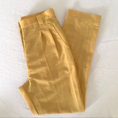 Deadstock American Apparel Micro-Poly High-Waist Pleated Pants In Golden Poppy Excellent/Like New Condition. Never Worn. Pleated High-Waisted Tailored Trousers In Light Yellow. Classic High Rise, Slim Fit, Straight Leg, Front Pleats, Back Darts, Front Zip, Belt Loops And Side Pockets. Smooth Micro-Poly Material. 100% Polyester. Size Medium Measurements Flat (Approx): Waist: 14.5“ / Hip: 21“ / Front Rise: 13“ / Inseam: 30“ / Leg Opening: 7“ Fitted Solid Color Work Pants For Summer, Fitted Work Pants For Summer, High Waist Work Pants For Summer, Fitted High Waist Work Pants For Summer, High Waist Summer Work Pants, Summer High-waisted Work Pants, Tailored Work Pants With Belt Loops For Spring, High Waist Summer Dress Pants With Welt Pockets, Fitted Ankle-length Work Pants For Spring