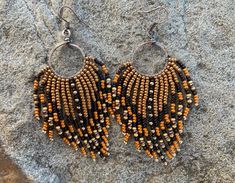 These earrings have beautiful colors in them! Perfect accessories to go with those fall sweaters!  Colors are sienna, tortoise, pumpkin, wheat, brownberry, and gold Beaded Fringe, Fall Sweaters, Fringe Earrings, Autumn Theme, Beautiful Colors, Jewelry Earrings Dangle, Dangle Drop Earrings, Dangle Earrings, Jewelry Earrings