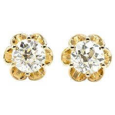 Our vintage inspired studs. The perfect size for everyday wear. We love these old European cut sparklers, weighing 1.36 carats total. In a super sweet 14kt yellow gold buttercup setting, we are just in love. This style can be created with any size diamond pair, please contact us for custom sizes, shapes and qualities. Diamond Details Primary Stones: (1) 0.67 ct. & (1) 0.69 ct. Old European cut diamonds Color/Clarity: K / VS2, L / VS2 Earring Specifications Total Diamond Weight: 1.36 ct. Mate Vintage Yellow Gold Diamond Earrings With Rose Cut, Vintage Gold Diamond Earrings With Brilliant Cut, Yellow Gold Rose Cut Diamond Anniversary Earrings, Vintage Yellow Gold Round Diamond Earrings, Classic Diamond Earrings With Rose Cut For Anniversary, Classic Rose Cut Diamond Earrings For Anniversary, Yellow Gold Diamond Earrings With Rose Cut For Anniversary, Yellow Gold Rose Cut Diamond Earrings For Anniversary, Vintage Yellow Gold Diamond Earrings With Prong Setting