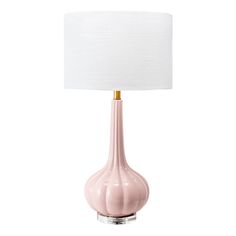 a pink table lamp with a white shade