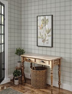 a wooden table sitting in the corner of a room