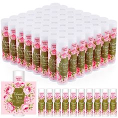 12 rolls of lip bale with pink flowers on them