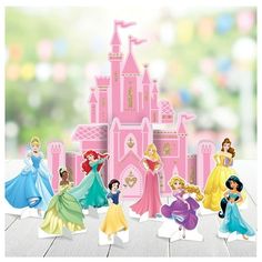 there are many princess figurines in front of the castle