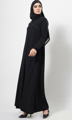 Introducing Premium Abaya Fabric- Nida, with a rich Drape & texture and flawless flow making it perfect silhouette to flatter every Wardrobe. Fabric is Nida Pear shaped Neck Front lace with a box pleat Zipper at back Flared at bottom Full Sleeves Lining not included Full length Elegant Long Sleeve Wedding Niqab, Wedding Dresses For Eid, Elegant Niqab For Eid, Elegant Solid Niqab For Eid, Elegant Black Abaya With Modesty Panel, Modest Floor-length Abaya, Modest Solid Color Floor-length Abaya, Solid Color Abaya With Modesty Panel For Eid, Eid Abaya With Modesty Panel In Solid Color